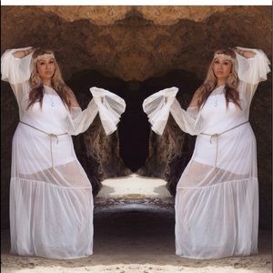 Sheer white dress in poor condition